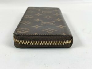 d045449a-1abd-4f5c-af92-c211244c19ba Clemence Wallet Monogram Canvas (pari al nuovo)